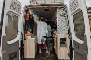 Emory University senior Alia Bly stands in the OKB Hope Foundation's mobile disease screening laboratory in Mobia, a rural community in the Ashanti region of southern Ghana. 